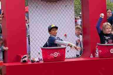 Boy throws a baseball at a Target Field Kids Day game