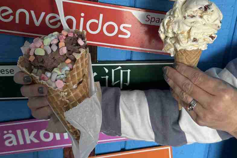 Big River Scoop waffle cone with rainbow marshmallows and a Praline Pecan gluten-free sugar cone